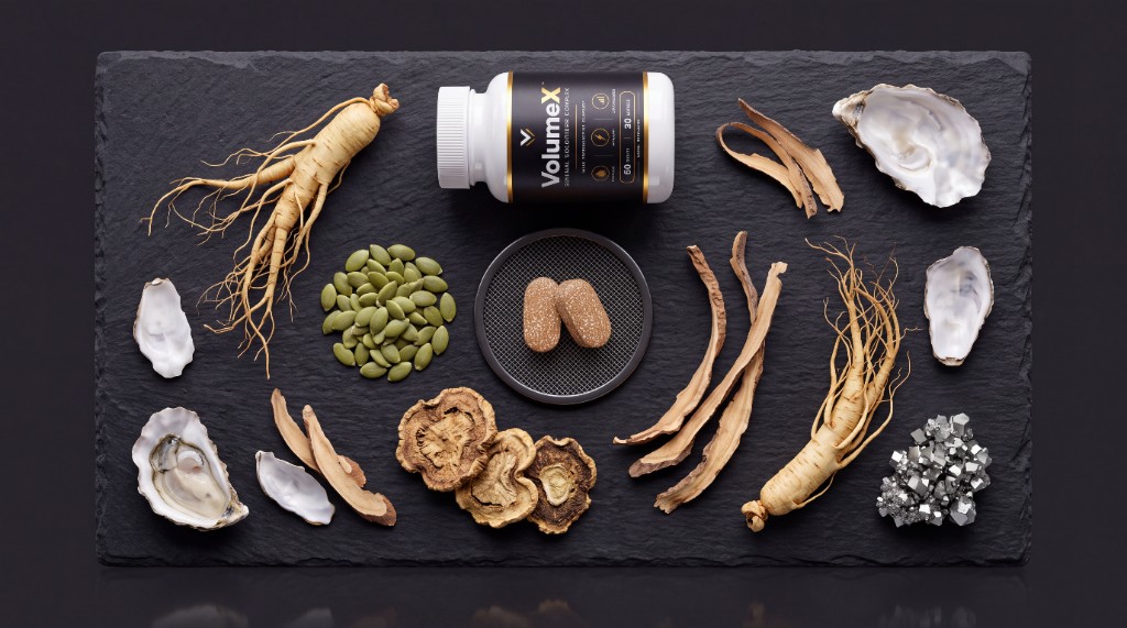 VolumeX bottle with zinc minerals, oyster, pumpkin seed, ginseng and maca on a slate lab surface